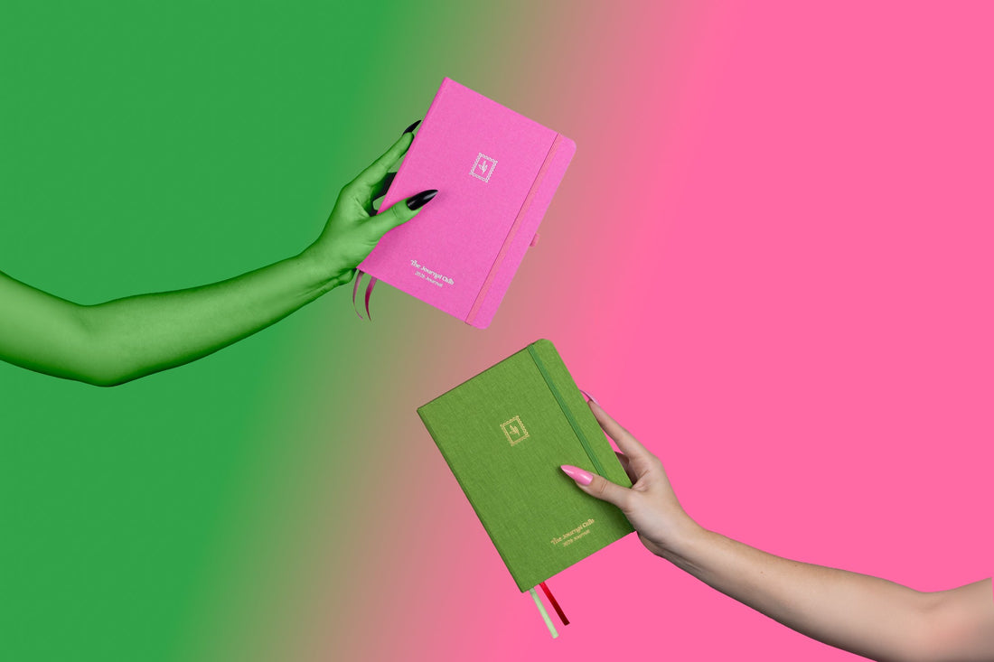 An Open Junk Journal with cut out arts and crafts papers, sticker and printed photos. 