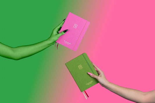 An Open Junk Journal with cut out arts and crafts papers, sticker and printed photos. 